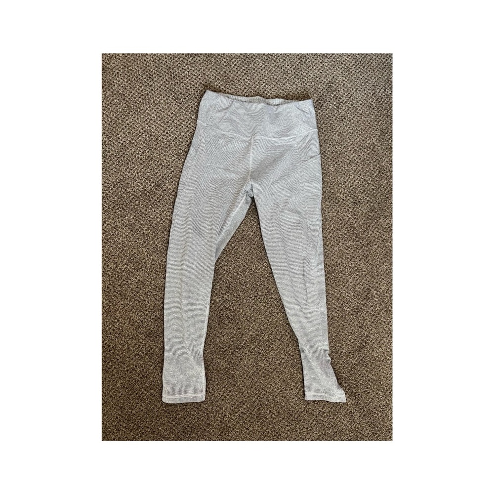 Black and white striped workout leggings with pockets